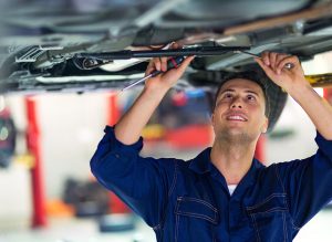 Expert Mechanic beneath car