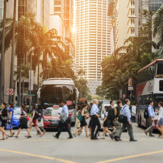 Singapore business district people crossing